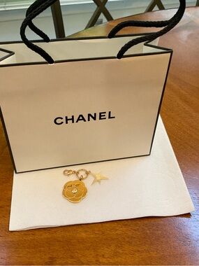 CHANEL Gold Camellia and Star Charm with Chanel bag NWT AUTHENTIC